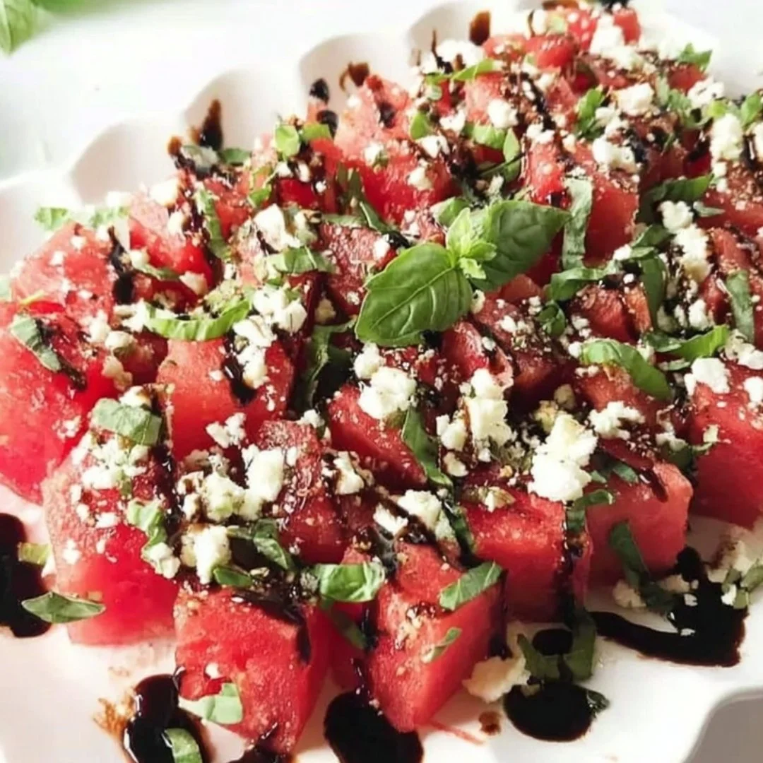 Delicious watermelon feta salad with mint and lime in a bowl